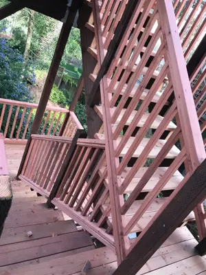 Custom wood deck railing and stair carpentry