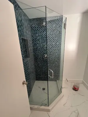 Custom Tiled Walk-In Shower with Bench and Glass Walls